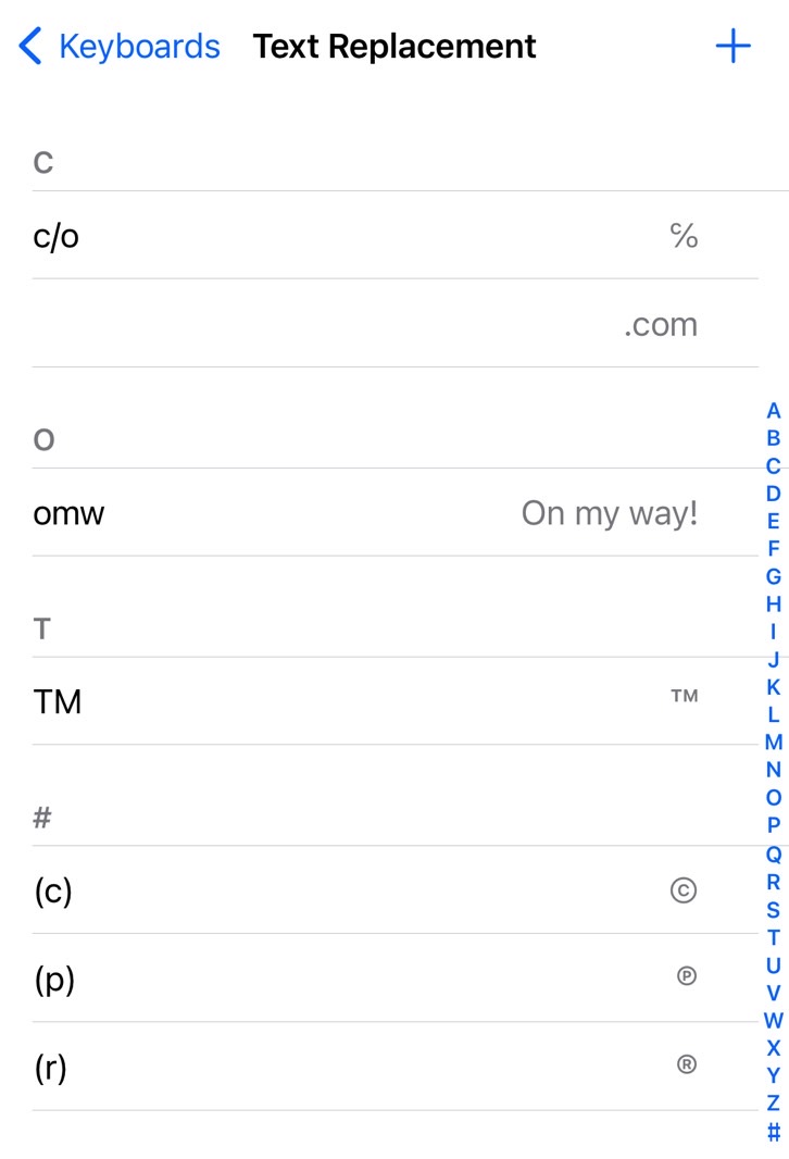 List of Text Replacement shortcuts in the iPhone's keyboard settings - the redacted
