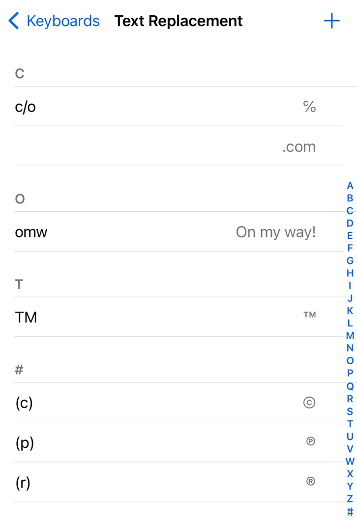 List of Text Replacement shortcuts in the iPhone's keyboard settings - the redacted 