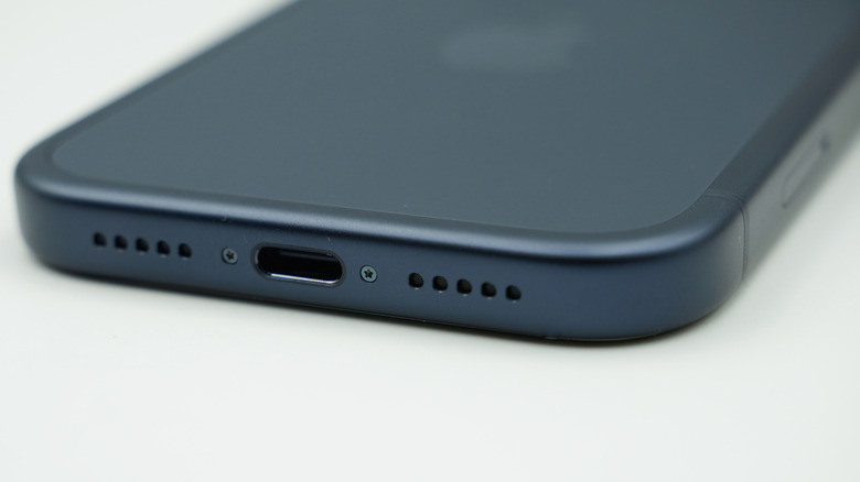 A close-up shot of an iPhone's speaker