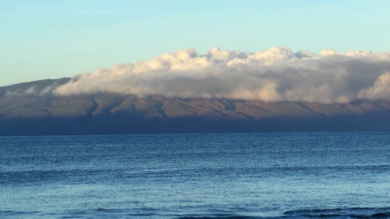 8x zoom photo of a mountain behind clouds from iPhone 18 Pro