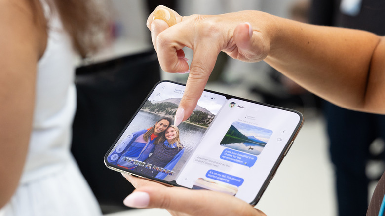 Someone using the iPhone Duo.